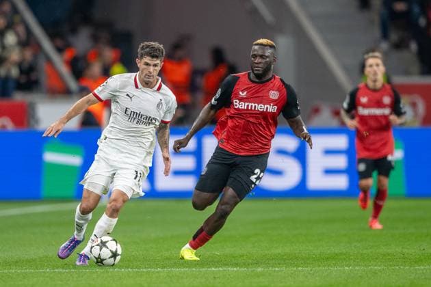 01 10 2024, Football UEFA Champions League, Season 2024 2025, Matchday 2, Bayer 04 Leverkusen AC Milan at the BayArena in Leverkusen duel between Christian Pulisic AC Milan, 11 and Victor Boniface Bayer 04 Leverkusen, 22 Photo Kirchner Media TH Copyright: xKirchner-Media THx