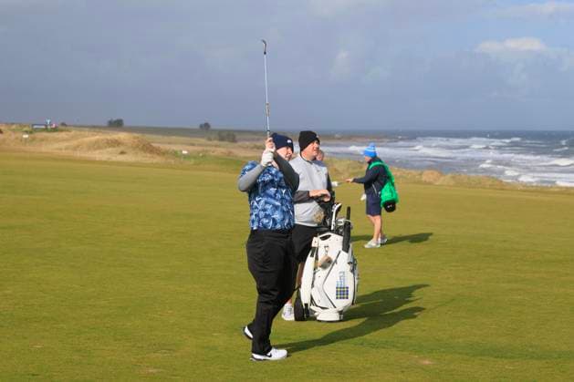 1st October 2024; Kingsbarns Golf Links, Fife, Scotland; Alfred Dunhill Links Golf Championship, Second Practice Day; Robert Macintyre of Scotland hits a shot from the fairway on the fourth hole on Kingsbarns Golf Links, during a practice round ahead of the Dunhill Links Championship  ActionPlus12698759 DavidxYoung