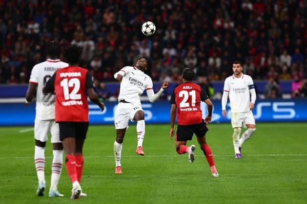 Rafael Leao 10 AC Milan in duel, action, with Amine Adli 21 Bayer 04 Leverkusen Bayer 04 Leverkusen vs AC Milan, Soccer, UEFA Champions League, Matchday 2, 01 10 2024 Photo kolbert press Ant Palmer BayArena NRW Germany Copyright: xkolbert-press AntxPalmerx
