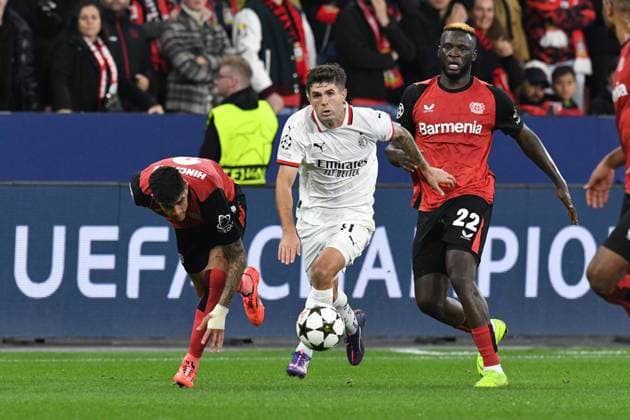 Christian Pulisic AC Milan takes on Piero Hincapie left Bayer 04 Leverkusen and Victor Boniface right Bayer 04 Leverkusen GER, Bayer 04 Leverkusen vs AC Milan, Football, UEFA Champions League, Matchday 2, Season 2024 2025, 01 10 2024 GER, Bayer 04 Leverkusen vs AC Milan, Football, UEFA Champions League, Matchday 2, Season 2024 2025, 01 10 2024 Leverkusen Copyright: xEibner-Pressefoto ThomasxThienelx EP_TTL