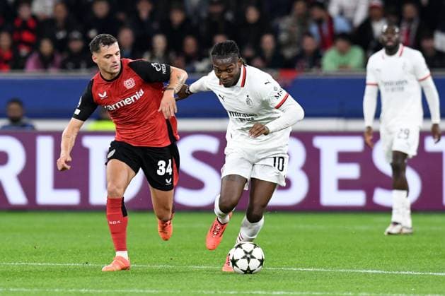 Granit Xhaka Bayer 04 Leverkusen in duel with Rafael Leao AC Milan GER, Bayer 04 Leverkusen vs AC Milan, Football, UEFA Champions League, Matchday 2, Season 2024 2025, 01 10 2024 GER, Bayer 04 Leverkusen vs AC Milan, Football, UEFA Champions League, Matchday 2, Season 2024 2025, 01 10 2024 Leverkusen Copyright: xEibner-Pressefoto ThomasxThienelx EP_TTL