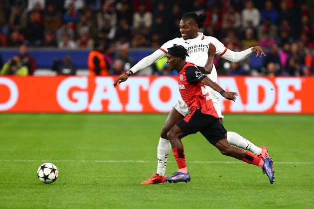 Rafael Leao 10 AC Milan in duel, action, with Jeremie Frimpong 30 Bayer 04 Leverkusen Bayer 04 Leverkusen vs AC Milan, Soccer, UEFA Champions League, Matchday 2, 01 10 2024 Photo kolbert press Ant Palmer BayArena NRW Germany Copyright: xkolbert-press AntxPalmerx