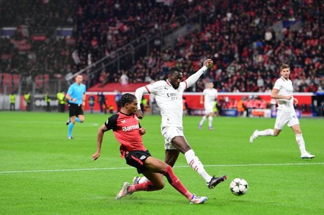 01 10 2024 Leverkusen Football, Men, UEFA Champions League,2 Matchday, Season 2024 2025, Bayer 04 Leverkusen vs AC Milan duel between v li Amine Adli Leverkusen , Fikayo Tomori Milan DFL regulations prohibit any use of photographs as image sequences and or quasi video BayArena NRW Germany