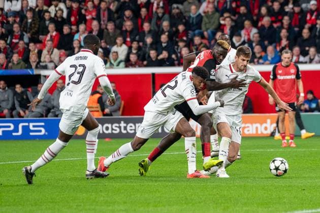 01 10 2024, Football UEFA Champions League, Season 2024 2025, Matchday 2, Bayer 04 Leverkusen AC Milan at the BayArena in Leverkusen Duel between Emerson AC Milan, 22 , Victor Boniface Bayer 04 Leverkusen, 22 and Matteo Gabbia AC Milan, 46 In front of Fikayo Tomori AC Milan, 23 Photo Kirchner Media TH Copyright: xKirchner-Media THx