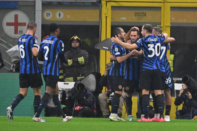 1st October 2024; Stadio San Siro, Milan, Italy, UEFA Champions League Football, Inter Milan versus Red Star Belgrade; Hakan Calhanoglu of FC Inter celebrates after scoring the goal for 1-0 in the 11th minute  ActionPlus12698786 AllShotLive