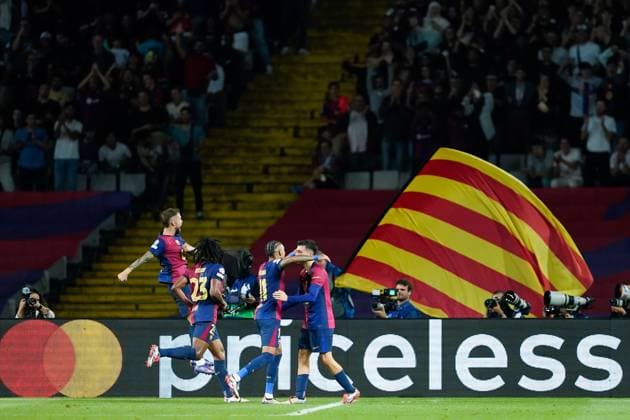 01 10 2024, Barcelona, Estadi Olimpic Lluis Companys, UEFA Champions League FC Barcelona vs BSC Young Boys, Players of FC Barcleona celebrate their goal in the back the Mastercard Priceless banner board Barcelona Estadi Olimpic Lluis Companys Cataluna Spain Copyright: xJustPictures.ch DanielaxPorcellix jp-en-DaPo-20241001-_DP12146