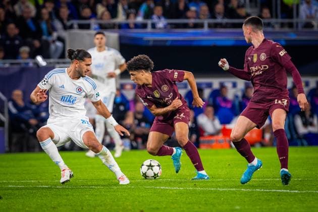 SLOVAN BRATISLAVA - MANCHESTER CITY Kyriakos Savvidis of Slovan and Rico Lewis, Phil Foden of Man City during the UEFA Champions League, league stage match between SK Slovan Bratislava and Manchester City. Bratislava, Slovakia, October 01, 2024. PUBLICATION NOT IN SLOVAKIA Copyright: xx slovanbratislava_manchestercity_championsleague_last012