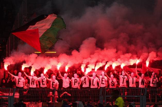 UEFA Champions League Borussia Dortmund Celtic Glasgow on 01 10 2024 at Signal Iduna Park in Dortmund Celtic Glasgow fans set off pyrotechnics in the visitors block and display Free Palestine shirts and flags MH