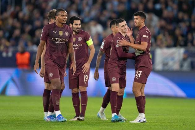Phil Foden a goal celebrate with his teammates during UEFA Champions league match, SK Slovan Bratislava - Manchester City , 01. october 2024 Copyright: xMICHALxFAJT,ZOSPORTU.SKx DSC_2210