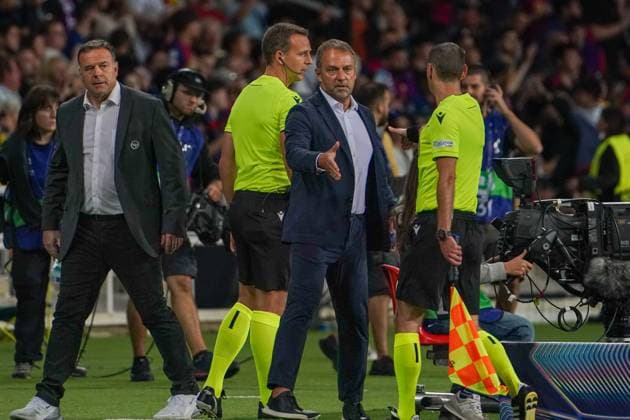 Football UEFA Champions League 2024 2025, Matchday 2 FC Barcelona vs BSC Young Boys Bern Estadi Olimpic Lluis Companys Barcelona Hansi Flick coach FC Barcelona and Patrick Rahmen BSC Young Boys, coach and the referee team Barcelona Estadi Olimpic Lluis Companys Spain Copyright: xJOERANxSTEINSIEKx