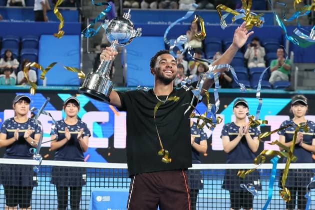 October 1, 2024, Tokyo, Japan - Arthur Fils of Francei raises a trophy as he won the Japan Open Tennis championships at the Ariake Colosseum in Tokyo on Tuesday, October 1, 2024. Fils defeated his compatriot Ugo Humbert in the final. (photo by Yoshio Tsunoda AFLO) Noxthirdxpartyxsales  (0766346539st)