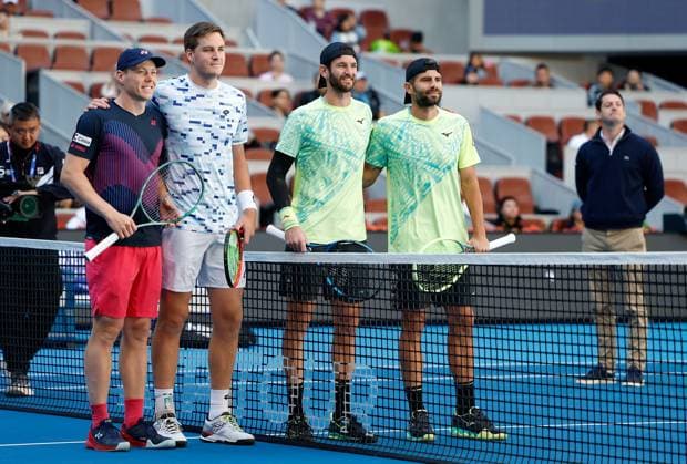 (241002) -- BEIJING, Oct. 2, 2024 -- Simone Bolelli (1st R) Andrea Vavassori pose for photos with Harri Heliovaara (1st L) Henry Patten before the men s doubles final between Simone Bolelli Andrea Vavassori of Italy and Harri Heliovaara (Finland) Henry Patten (Britain) at the 2024 China Open tennis tournament in Beijing, China, Oct. 2, 2024. ) (SP)CHINA-BEIJING-TENNIS-CHINA OPEN-MEN S DOUBLES-FINAL (CN) WangxLili 