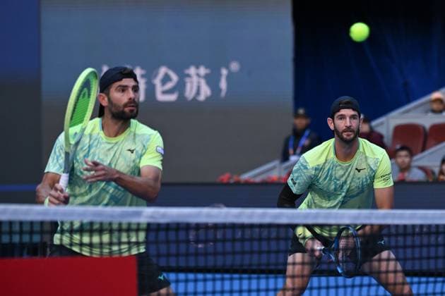 (241002) -- BEIJING, Oct. 2, 2024 -- Simone Bolelli (L) Andrea Vavassori compete during the men s doubles final between Simone Bolelli Andrea Vavassori of Italy and Harri Heliovaara (Finland) Henry Patten (Britain) at the 2024 China Open tennis tournament in Beijing, China, Oct. 2, 2024. ) (SP)CHINA-BEIJING-TENNIS-CHINA OPEN-MEN S DOUBLES-FINAL (CN) ZhangxLong 