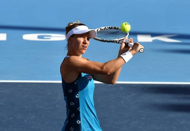 (241002) -- HONG KONG, Oct. 2, 2024 -- Viktorija Golubic of Switzerland hits a return during the women s singles match between Emma Navarro of the United States and Viktorija Golubic of Switzerland at WTA, Tennis Damen Hong Kong 125 Open tennis tournament in Hong Kong, south China, Oct. 2, 2024. (Photo by Lo Ping Fai Xinhua) (SP)CHINA-HONG KONG-TENNIS-WTA 125 (CN) LuxBinghui 