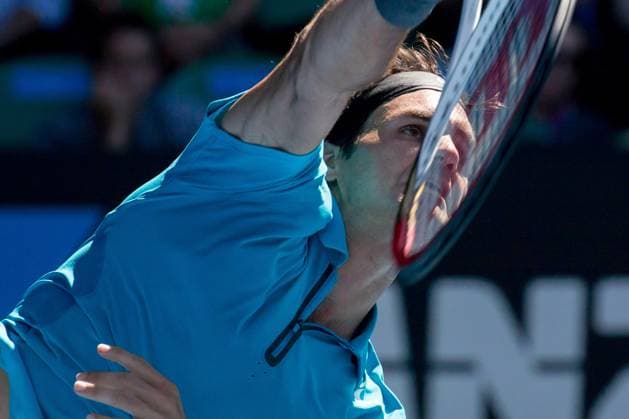 Archivbilder der Woche SPORT KW40 Tennis 2013: Australian Open JAN 15 Jan. 15, 2013 - Melbourne, Victoria, Australia - January 15, 2013: Roger Federer (SUI) in action in a first round match against Benoit Paire (FRA) on day two of the 2013 Australian Open grand slam tennis tournament at Melbourne Park in Melbourne, Australia. Federer won 62 64 61. Sydney Low Cal Media Melbourne Victoria Australia EDITORIAL USE ONLY Copyright: xx ZUMA-20130115_zaf_c04_038.jpg SydneyxLowx csmphoto703862
