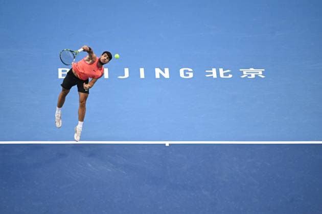 (241002) -- BEIJING, Oct. 2, 2024 -- Carlos Alcaraz of Spain serves during the Men s Singles Final between Jannik Sinner of Italy and Carlos Alcaraz of Spain at the 2024 China Open tennis tournament in Beijing, capital of China, Oct. 2, 2024. ) (SP)CHINA-BEIJING-TENNIS-CHINA OPEN-MEN S SINGLES-FINAL (CN) ZhangxLong 