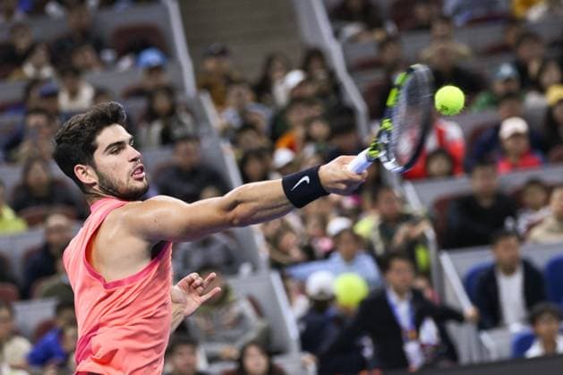(241002) -- BEIJING, Oct. 2, 2024 -- Carlos Alcaraz of Spain hits a return during the Men s Singles Final between Jannik Sinner of Italy and Carlos Alcaraz of Spain at the 2024 China Open tennis tournament in Beijing, capital of China, Oct. 2, 2024. ) (SP)CHINA-BEIJING-TENNIS-CHINA OPEN-MEN S SINGLES-FINAL (CN) ZhangxLong 