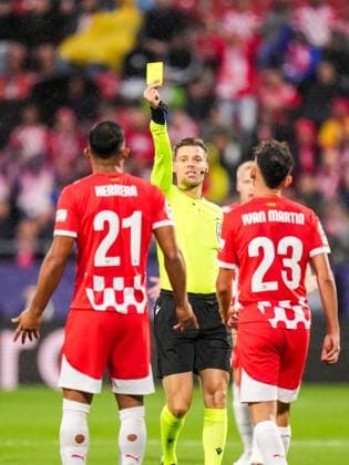 UEFA Champions League: Girona FC v Feyenoord Girona - Yangel Herrera of Girona FC, Referee Urs Schnyder during the second round of new format of the UEFA Champions League 2024 2025. The match is set between Girona FC and Feyenoord at Estadi Montilivi on 2 October 2024 in Girona, Spain. Copyright: xYannickxVerhoevenx