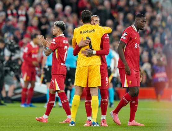 Liverpool FC v Bologna FC Liverpool goalkeeper Alisson Becker (1) arms round Liverpool forward Darwin Nunez (9) during the Liverpool FC v Bologna FC UEFA Champions League Round 1 match at Anfield, Liverpool, England, United Kingdom on 2 October 2024 Editorial use only. All images are copyright Every Second Media Limited. No images may be reproduced without prior permission. Copyright: xIMAGO EveryxSecondxMediax ESM-1152-0037