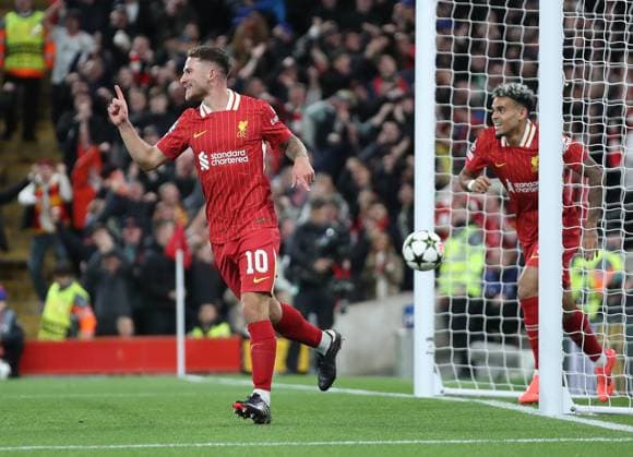 Liverpool, England, 2nd October 2024. Alexis Mac Allister of Liverpool celebrates after scoring the opening goal during the UEFA Champions League match at Anfield, Liverpool. Picture credit should read: Jessica Hornby Sportimage EDITORIAL USE ONLY. No use with unauthorised audio, video, data, fixture lists, club league logos or live services. Online in-match use limited to 120 images, no video emulation. No use in betting, games or single club league player publications. SPI-3353-0005