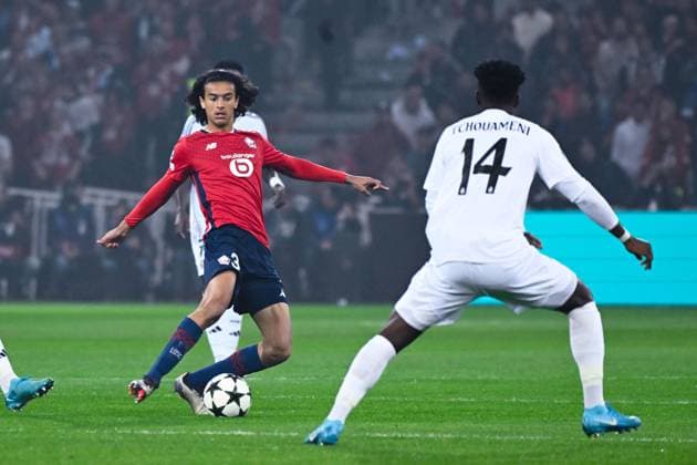 Ayyoub BOUADDI ( 32 - Lille ) and Aurelien Tchouameni ( 14 - Real Madrid ) during the UEFA Champions League match between Lille OSC and Real Madrid CF at Stade Pierre Mauroy on October 02, 2024 in Lille, France. ( Photo by federico pestellini panoramic ) - FOOTBALL : Lille vs Real Madrid - Ligue des Champions - 02 10 2024 FedericoPestellini Panoramic 