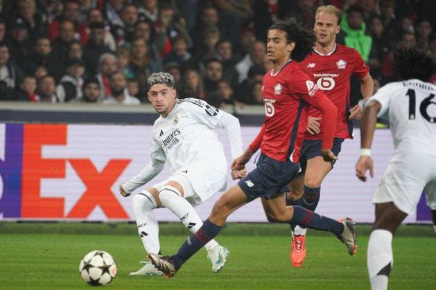 Federico Valverde of Real Madrid Lille v Real Madrid, UEFA Champions League, Group Stage, Football, Pierre Mauroy Stadium, Lille, France, 02 Oct 2024 EDITORIAL USE ONLY No use with unauthorised audio, video, data, fixture lists, club league logos or live services. Online in-match use limited to 120 images, no video emulation. No use in betting, games or single club league player publications. Copyright: xDavexWinter Shutterstockx 14750773ai