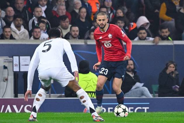 Edon ZHEGROVA ( 23 - Lille ) and Jude Bellingham ( 5 - Real Madrid ) during the UEFA Champions League match between Lille OSC and Real Madrid CF at Stade Pierre Mauroy on October 02, 2024 in Lille, France. ( Photo by federico pestellini panoramic ) - FOOTBALL : Lille vs Real Madrid - Ligue des Champions - 02 10 2024 FedericoPestellini Panoramic 