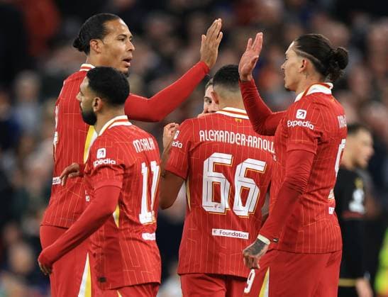 Liverpool, England, 2nd October 2024. Virgil van Dijk and lo0 celebrate after Alexis Mac Allister of Liverpool scores to make it 1-0 during the UEFA Champions League match at Anfield, Liverpool. Picture credit should read: Jessica Hornby Sportimage EDITORIAL USE ONLY. No use with unauthorised audio, video, data, fixture lists, club league logos or live services. Online in-match use limited to 120 images, no video emulation. No use in betting, games or single club league player publications. SPI-3353-0008