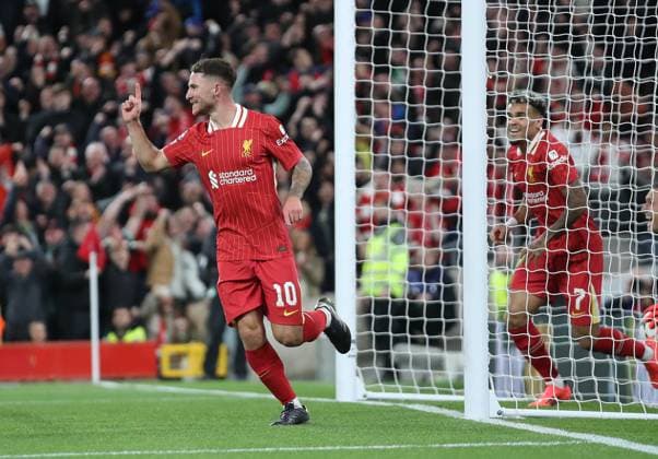Liverpool, England, 2nd October 2024. Alexis Mac Allister of Liverpool celebrates after scoring to make it 1-0 during the UEFA Champions League match at Anfield, Liverpool. Picture credit should read: Jessica Hornby Sportimage EDITORIAL USE ONLY. No use with unauthorised audio, video, data, fixture lists, club league logos or live services. Online in-match use limited to 120 images, no video emulation. No use in betting, games or single club league player publications. SPI-3353-0010