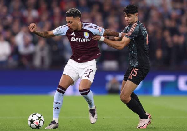 Birmingham, England, 2nd October 2024. Morgan Rogers of Aston Villa and Aleksandar Pavlovic of Bayern Munich challenge for the ball during the UEFA Champions League match at Villa Park, Birmingham. Picture credit should read: Cameron Smith Sportimage EDITORIAL USE ONLY. No use with unauthorised audio, video, data, fixture lists, club league logos or live services. Online in-match use limited to 120 images, no video emulation. No use in betting, games or single club league player publications. SPI-3354-0034