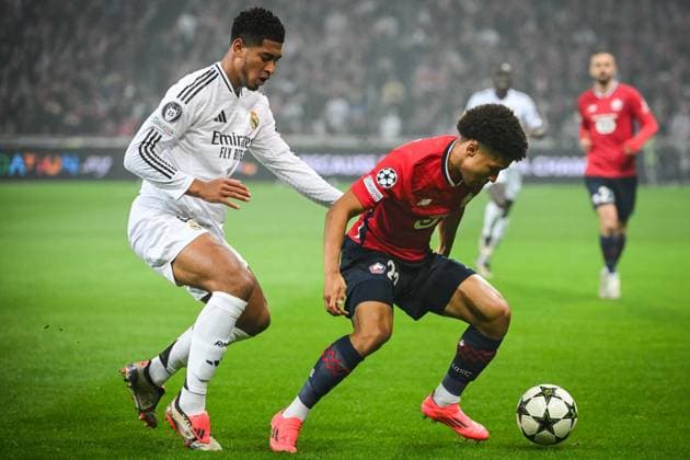 October 2, 2024, Villeneuve-D ascq, France, France: Jude BELLINGHAM of Real Madrid and Tiago SANTOS of Lille during the UEFA Champions League, League Phase MD2 match between Lille OSC (LOSC) and Real Madrid at Pierre Mauroy Stadium on October 02, 2024 in Villeneuve-d Ascq near Lille, France. Villeneuve-D ascq France - ZUMAm308 20241002_zsp_m308_004 Copyright: xMatthieuxMirvillex