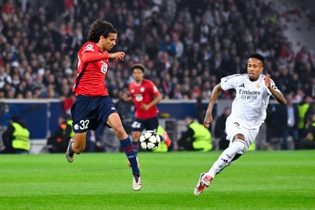 Ayyoub BOUADDI ( 32 - Lille ) and Eder Militao ( 3 - Real Madrid ) during the UEFA Champions League match between Lille OSC and Real Madrid CF at Stade Pierre Mauroy on October 02, 2024 in Lille, France. ( Photo by federico pestellini panoramic ) - FOOTBALL : Lille vs Real Madrid - Ligue des Champions - 02 10 2024 FedericoPestellini Panoramic 