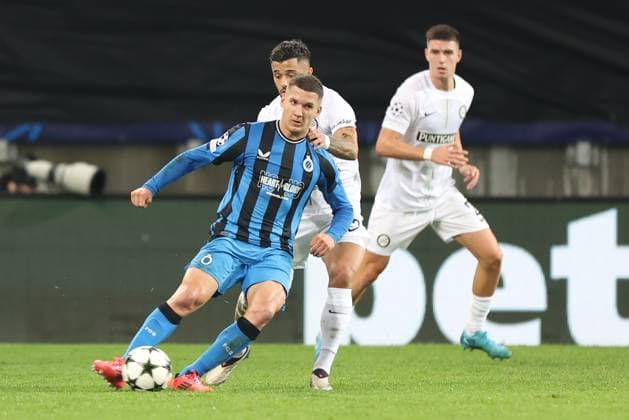SOCCER - UEFA CL, Sturm vs Brugge KLAGENFURT,AUSTRIA,02.OCT.24 - SOCCER - UEFA Champions League, SK Sturm Graz vs Club Brugge. Image shows Christos Tzolis (Bruegge) and Jusuf Gazibegovic (Sturm).  GEPAxpictures xChrisxBauer