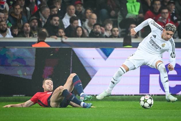October 2, 2024, Villeneuve-D ascq, France, France: Gabriel GUDMUNDSSON of Lille and Federico VALVERDE of Real Madrid during the UEFA Champions League, League Phase MD2 match between Lille OSC (LOSC) and Real Madrid at Pierre Mauroy Stadium on October 02, 2024 in Villeneuve-d Ascq near Lille, France. Villeneuve-D ascq France - ZUMAm308 20241002_zsp_m308_005 Copyright: xMatthieuxMirvillex