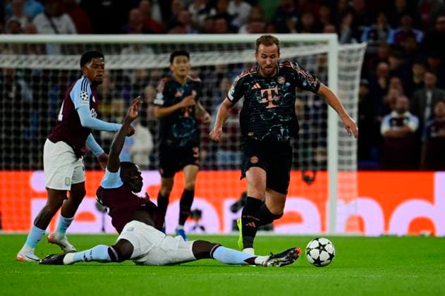 Aston Villa v Bayern Munich , Birmingham, UK - 02 Oct 2024 Harry Kane of Bayern Munich challenges for the ball with Amadou Onana of Aston Villa during the UEFA Champions League game between Aston Villa and Bayern Munich at Villa Park, Birmingham on 02 Oct 2024 Birmingham Villa Park Birmingham GBR Copyright: xGeorgexWass PPAUKx PPA-139843