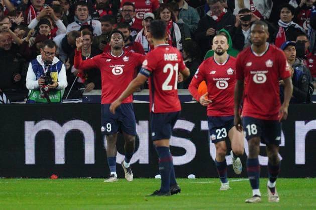Jonathan David of Lille celebrates after he puts his side 1-0 ahead with a penalty following an intervention by VAR Lille v Real Madrid, UEFA Champions League, Group Stage, Football, Pierre Mauroy Stadium, Lille, France, 02 Oct 2024 EDITORIAL USE ONLY No use with unauthorised audio, video, data, fixture lists, club league logos or live services. Online in-match use limited to 120 images, no video emulation. No use in betting, games or single club league player publications. Copyright: xDavexWinter Shutterstockx 14750773ba