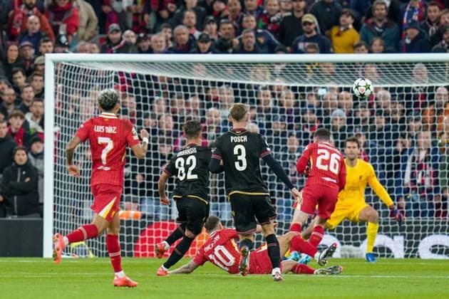 Liverpool FC v Bologna FC Bologna midfielder Kacper Urbanski (82) shoots at goal during the Liverpool FC v Bologna FC UEFA Champions League Round 1 match at Anfield, Liverpool, England, United Kingdom on 2 October 2024 Editorial use only. All images are copyright Every Second Media Limited. No images may be reproduced without prior permission. Copyright: xIMAGO EveryxSecondxMediax ESM-1152-0067
