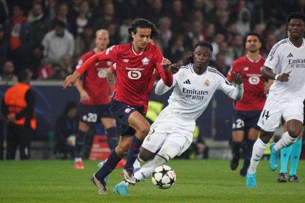 Ayyoub Bouaddi of Lille and Eduardo Camavinga of Real Madrid Lille v Real Madrid, UEFA Champions League, Group Stage, Football, Pierre Mauroy Stadium, Lille, France, 02 Oct 2024 EDITORIAL USE ONLY No use with unauthorised audio, video, data, fixture lists, club league logos or live services. Online in-match use limited to 120 images, no video emulation. No use in betting, games or single club league player publications. Copyright: xDavexWinter Shutterstockx 14750773bm