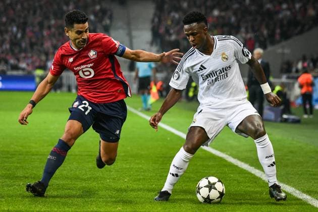 Champions League Lille vs Real Madrid FA Real Madrid’s forward Vinicius Junior fights for the ball during the UEFA Champions League football match between LOSC Lille and Real Madrid CF at the Pierre Mauroy Stadium in Lille on October 2, 2024. Photo by Firas Abdullah ABACAPRESS.COM Paris Ile-de-France France  Copyright: xAbdullahxFiras ABACAx