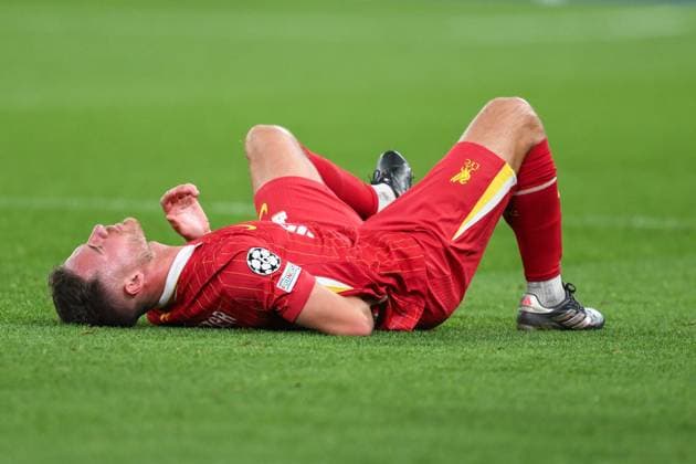 UEFA Champions League - League Stage Liverpool v Bologna Alexis Mac Allister of Liverpool goes down with injury during the UEFA Champions League - League Stage match Liverpool vs Bologna at Anfield, Liverpool, United Kingdom, 2nd October 2024 (Photo by Craig Thomas News Images) Liverpool Anfield Merseyside United Kingdom Copyright: xCraigxThomas NewsxImagesx