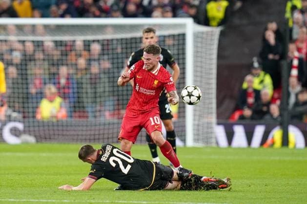 Liverpool FC v Bologna FC Liverpool midfielder Alexis Mac Allister (10) tackled by Bologna midfielder Michel Aebischer (20) during the Liverpool FC v Bologna FC UEFA Champions League Round 1 match at Anfield, Liverpool, England, United Kingdom on 2 October 2024 Editorial use only. All images are copyright Every Second Media Limited. No images may be reproduced without prior permission. Copyright: xIMAGO EveryxSecondxMediax ESM-1152-0075