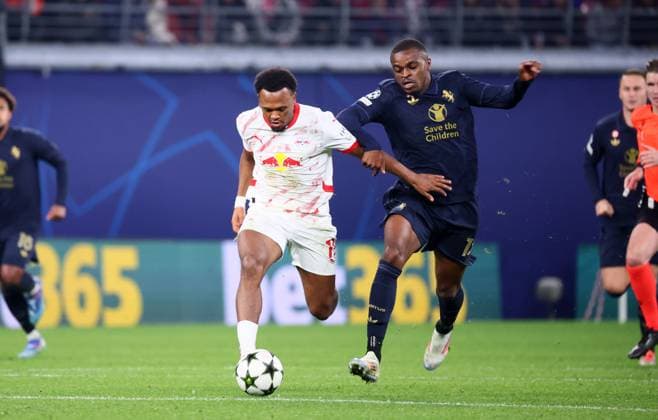 RB Leipzig Juventus Turin Champions League Leipzig, 02 10 2024, Red Bull Arena, Football, UEFA Champions League, Matchday 2 , RB Leipzig vs Juventus Turin , Pictured from left Lois Openda 11, RB Leipzig , Pierre Kalulu 15, JUVE , For editorial use only Only editorial use , UEFA regulations prohibit any use of photographs as image sequences and or quasi video ,