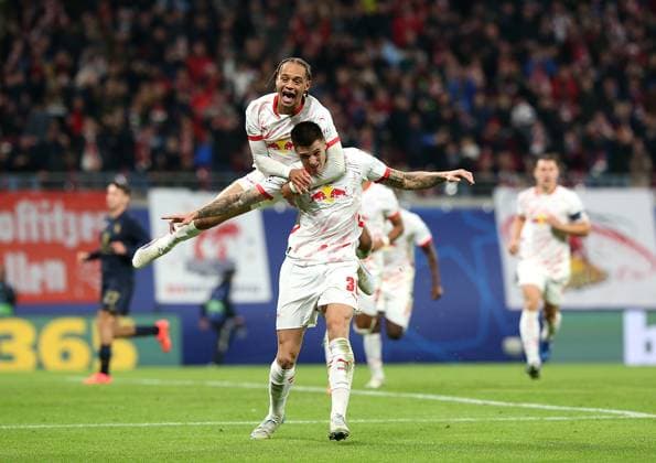 02 10 2024, Football UEFA Champions League 2024 2025, Matchday 2, RB Leipzig Juventus Turin, in the Red Bull Arena Leipzig cheering L R Xavi Simons RB Leipzig and scorer Benjamin Sesko RB Leipzig for the 2 1 goal from the penalty spot DFL and DFB regulations prohibit any use of photographs as image sequences and or quasi video