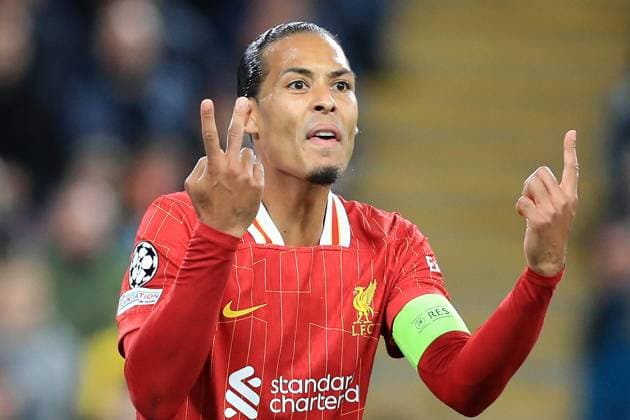 2nd October 2024; Anfield, Liverpool, Merseyside, England; Champions League Football, Liverpool versus Bologna; Virgil van Dijk of Liverpool gestures to his team mates after Bologna narrowly fail to score  ActionPlus12699191 DavidxBlunsden