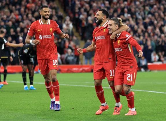 2nd October 2024; Anfield, Liverpool, Merseyside, England; Champions League Football, Liverpool versus Bologna; Mohammed Salah of Liverpool celebrates after scoring for 2-0 after 75 minutes  ActionPlus12699217 DavidxBlunsden