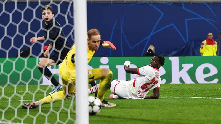 Soccer UEFA Champions League, season 2024 2025, group stage, match day 2, at the match RB Leipzig vs Juventus Turin 02 10 2024 goalscorer Francisco Conceição Conceicao right winger Juventus Turin, back number 7 center scores against Peter Gulacsi goalkeeper RB Leipzig, back number 1, 1 and Castello Lukeba central defender RB Leipzig, back number 23, 23 for 3 2 for Turin at the match RB Leipzig vs Juventus Turin 02 10 2024 Leipzig Saxony Germany Red Bull Arena