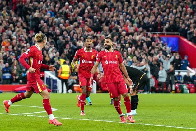 Liverpool FC v Bologna FC Liverpool forward Mohamed Salah (11) scores a GOAL 2-0 and celebrates during the Liverpool FC v Bologna FC UEFA Champions League Round 1 match at Anfield, Liverpool, England, United Kingdom on 2 October 2024 Editorial use only. All images are copyright Every Second Media Limited. No images may be reproduced without prior permission. Copyright: xIMAGO EveryxSecondxMediax ESM-1152-0096