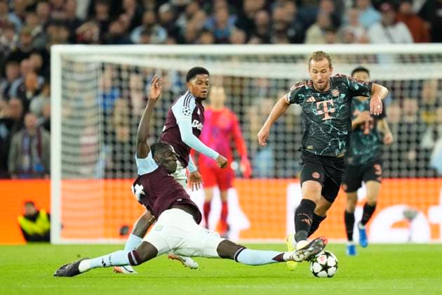 Aston Villa FC v FC Bayern München - UEFA Champions League 2024 25 League Phase MD2 Harry Kane centre-forward of Bayern Munich and England and Amadou Onana defensive midfield of Aston Villa and Belgium compete for the ball during the UEFA Champions League 2024 25 League Phase MD2 match between Aston Villa FC and FC Bayern München at Villa Park on October 2, 2024 in Birmingham, England. Birmingham England United Kingdom  Copyright: xJosexBretonx originalFilename:bretonhernandez-astonvil241002_npAfr.jpg