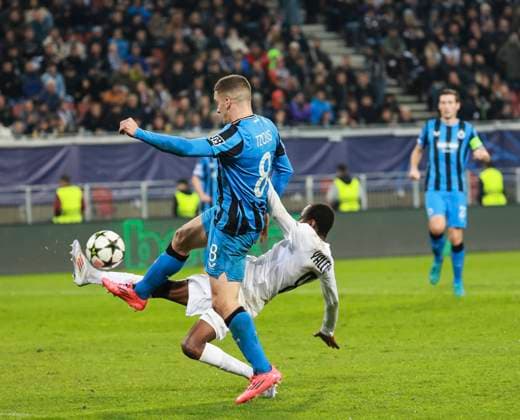 SOCCER - UEFA CL, Sturm vs Brugge KLAGENFURT,AUSTRIA,02.OCT.24 - SOCCER - UEFA Champions League, SK Sturm Graz vs Club Brugge. Image shows Christos Tzolis (Club Brügge) and Alexander Prass (Sturm).  GEPAxpictures xWolfgangxGrebien