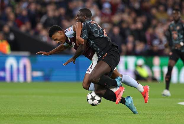 Football - 2024 2025 UEFA Champions League - League Phase - Matchday 2 8 - Aston Villa vs Bayern Munich - Villa Park - Wednesday 2nd October 2024 Ollie Watkins of Aston Villa and Dayot Upamecano of Bayern Munich 